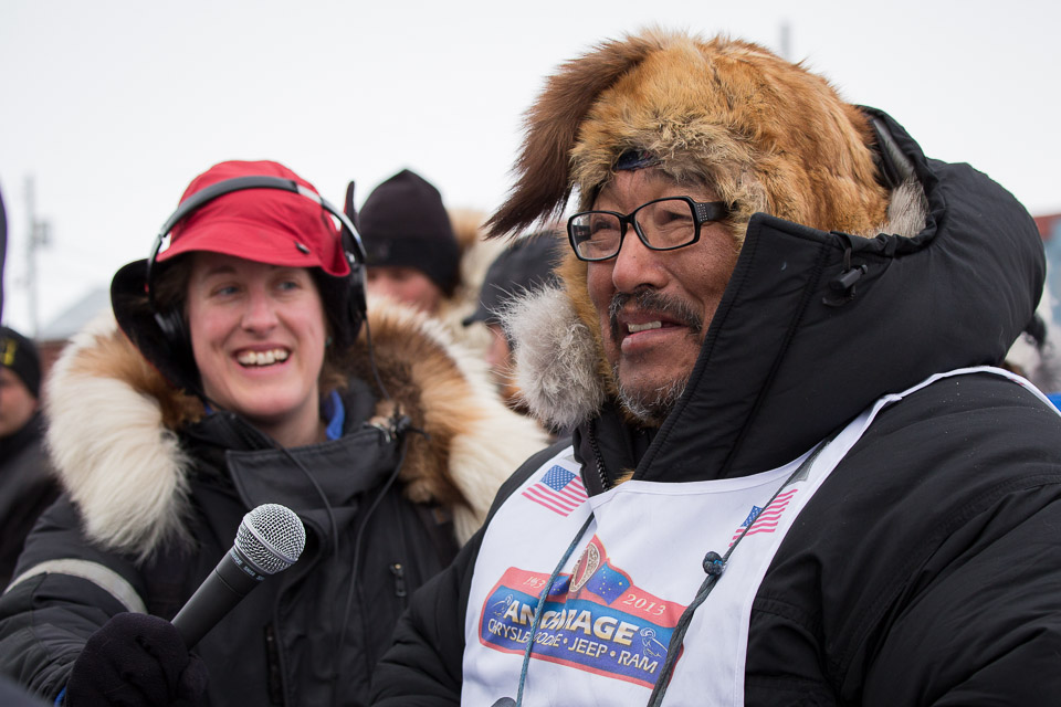 Mike Williams Sr. speaking to KNOM during 2013 Iditarod sled dog race. Photo Credit: KNOM (2013)