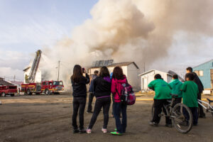 Onlookers and the East 3rd Avenue fire in Nome