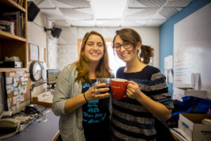 Francesca Fenzi and Jenn Ruckel in KNOM's newsroom