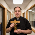 April 2015: Father Ross with Diomede Crucifix