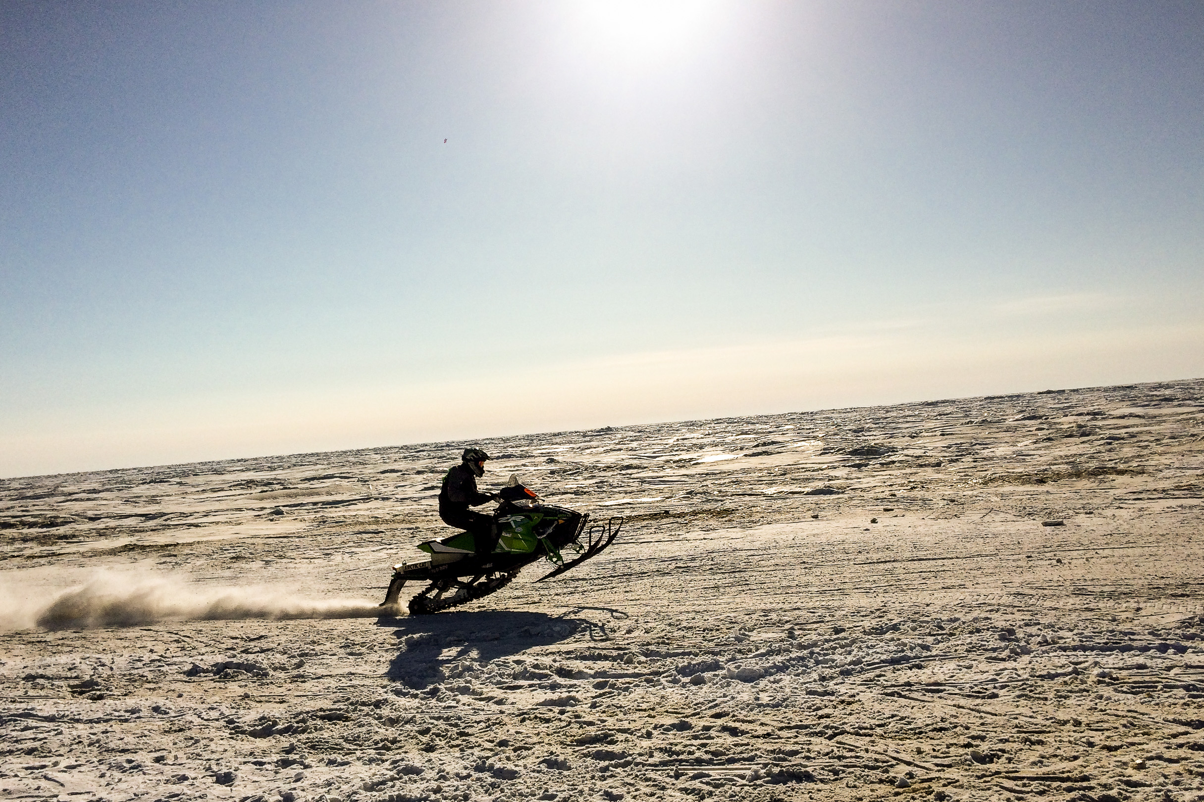 Racer in 2016 Nome-Golovin Snowmachine Race Photo: Mitch Borden, KNOM.