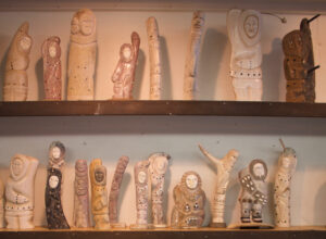 Walrus ivory carvings and masks, like these on display at Maruskiya's in Nome, may be threatened by other states' bans on the sale, purchase, and trade of various types of ivory. Photo: Emily Russell/KNOM.