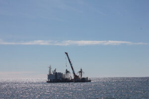 A cable-laying vessel with Quintillion, viewed from Nome's Front St. Photo: Lauren Frost/KNOM