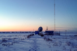 The KNOM AM transmitter site, surrounded by snowy tundra.