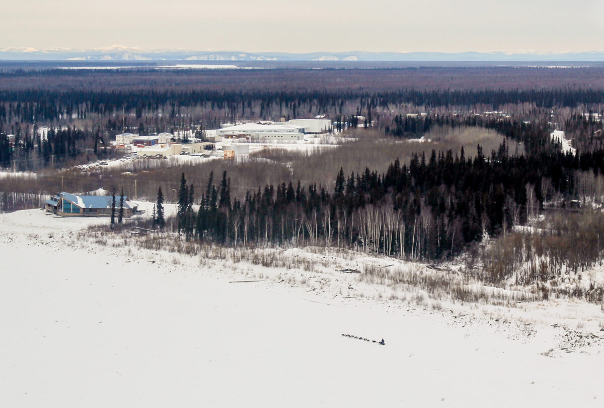 An aerial view of Michelle Phillips mushing towards the Galena checkpoint
