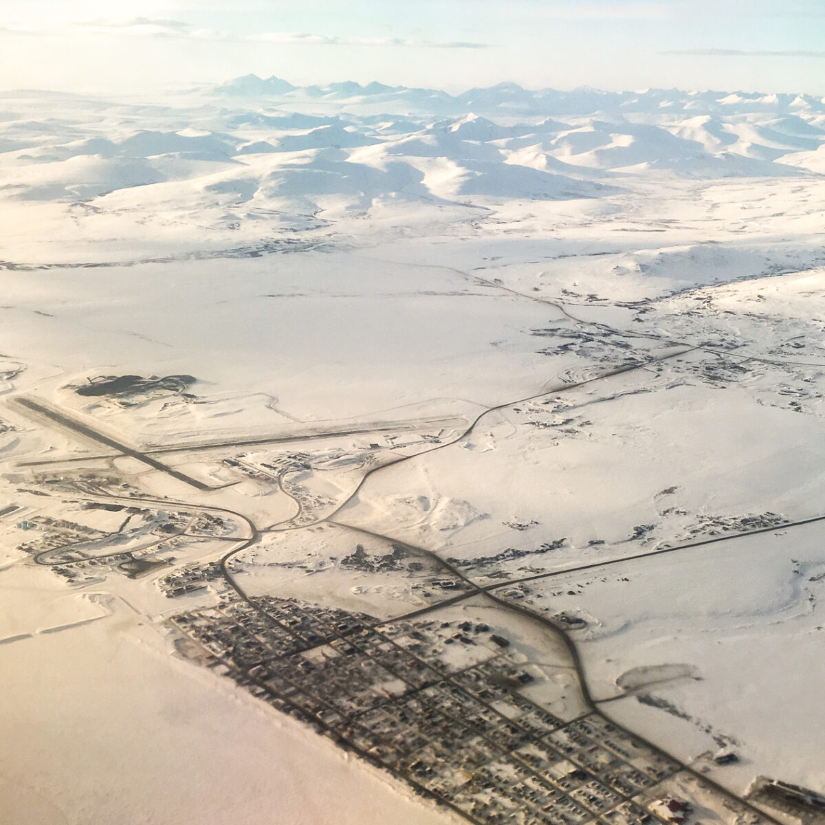 An aerial view of Nome, Alaska, and the surrounding countryside.