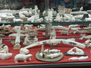 Various carvings made from ivory on display at Maruskiya's in Nome. Most of these pieces are made from walrus ivory. Photo Credit: Davis Hovey, KNOM (2017)