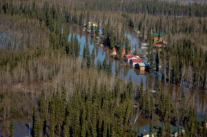 An aerial overview of flooding in a small Alaska village
