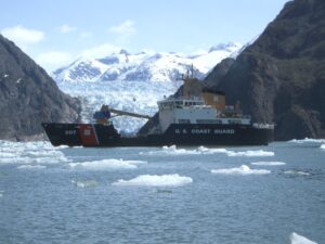The US Coast Guard Cutter Maple cruises past the LeConte Glacier.