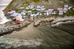 An aerial view of a small, coastal village