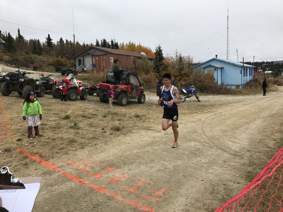 Nome's Jamie Yi crosses the finish line in White Mountain, 2017