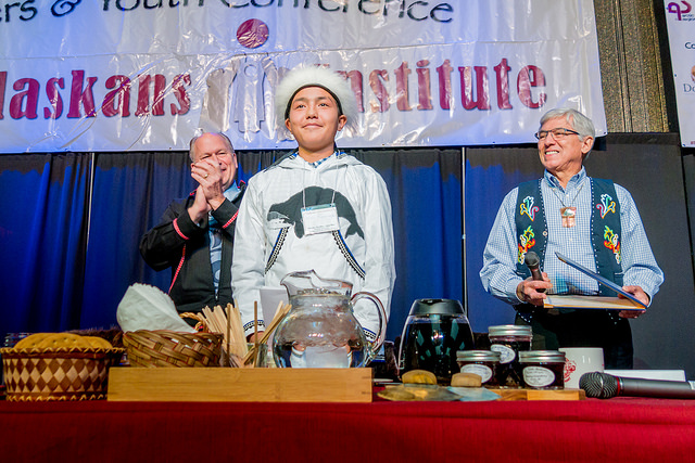 Governor Walker and Lt. Governor Mallott stand beside Apassingok from Gambell in the Dena'ina Center.