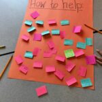 Brightly colored sticky notes cover a poster labeled "How to help," where they brainstormed ideas for supporting friends going through a hard time.