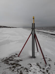 UAF's storm surge sensor set up in Shaktoolik to gather data on wave levels and more for NOAA weather forecasts. Photo Credit: Davis Hovey, KNOM (2017)