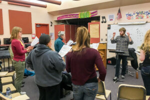 Gabe leads the Nome Community Chorus in rehearsal