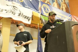 Mike Morgan of Nome and racing partner Chris Olds receive awards for being fastest team into Nome in 2018 Iron Dog race. Photo Credit: Gabe Colombo, KNOM (2018)
