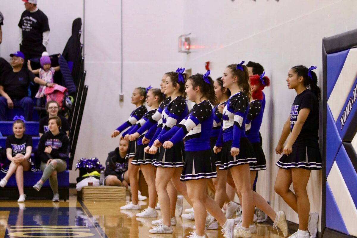 The Nome-Beltz Nanooks cheer teem at a basketball game (Photo: Janeen Sullivan, used with permission)