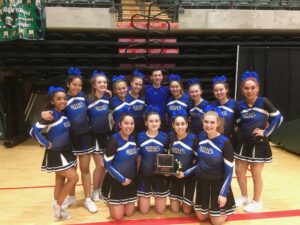 The Nome-Beltz Nanooks cheer team with their first-place trophy for the large division, 2018 (Photo courtesy of Elizabeth Coler, used with permission)