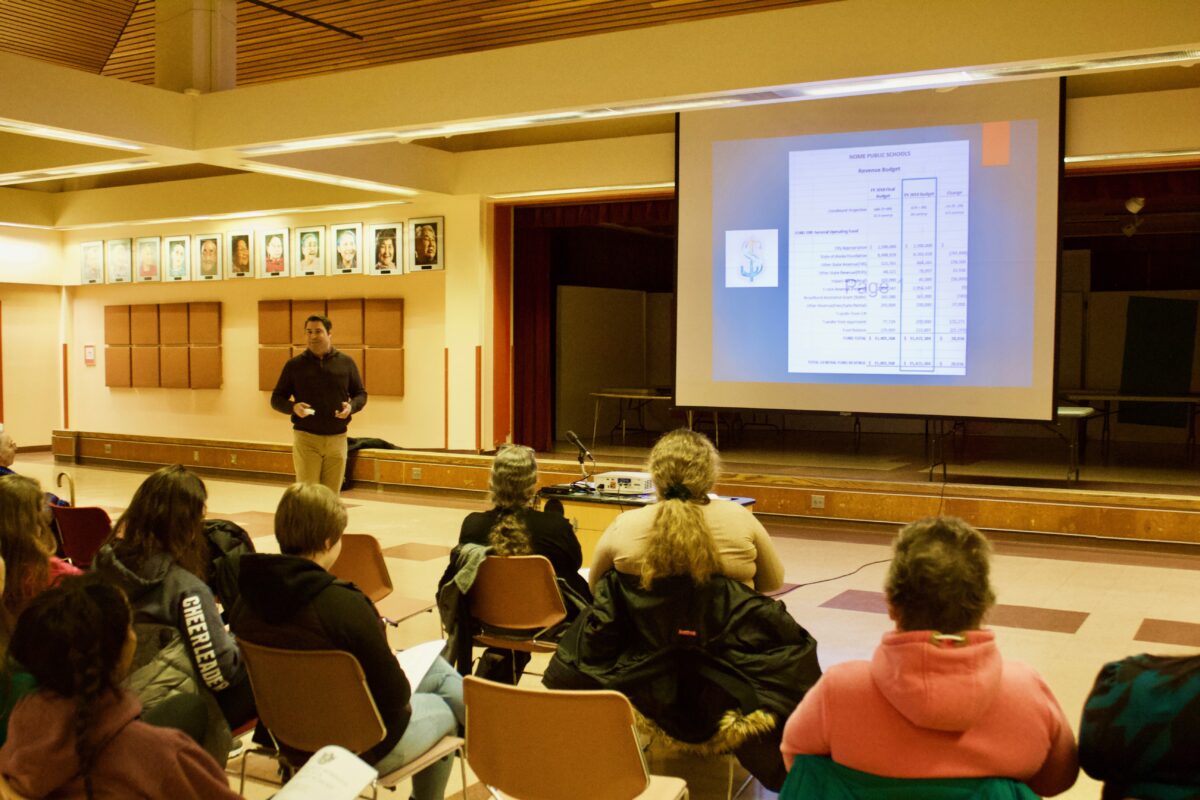 Superintendent Shawn Arnold discusses the Nome Public Schools fiscal year-19 draft budget at a public budget meeting (Photo: Gabe Colombo, KNOM)