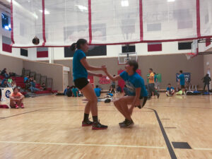 NYO competitors from Unalakleet lend each other a helping hand at the 33rd annual BSSD NYO Tournament.
