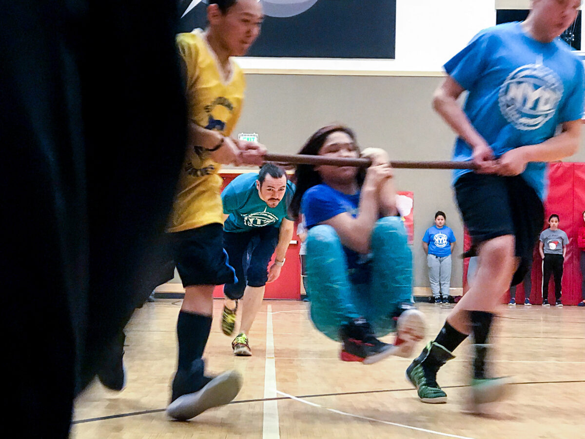 Wrist-carry competitors race at the 2018 BSSD NYO tournament in St. Michael, Alaska.