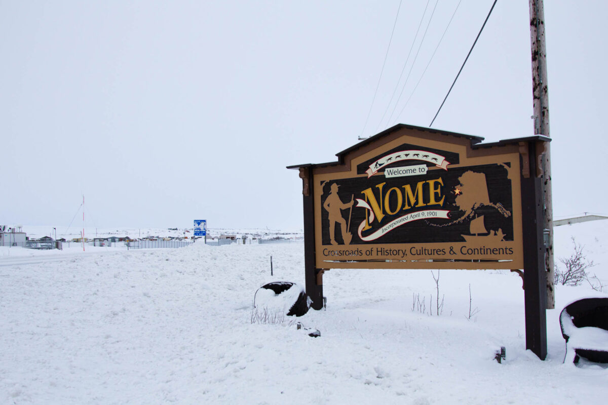 Welcome to Nome sign in winter time