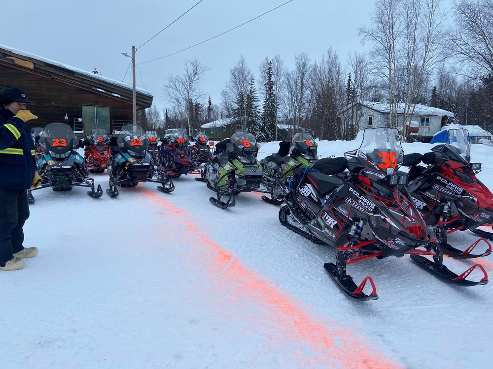 Snow machine racers at the starting line