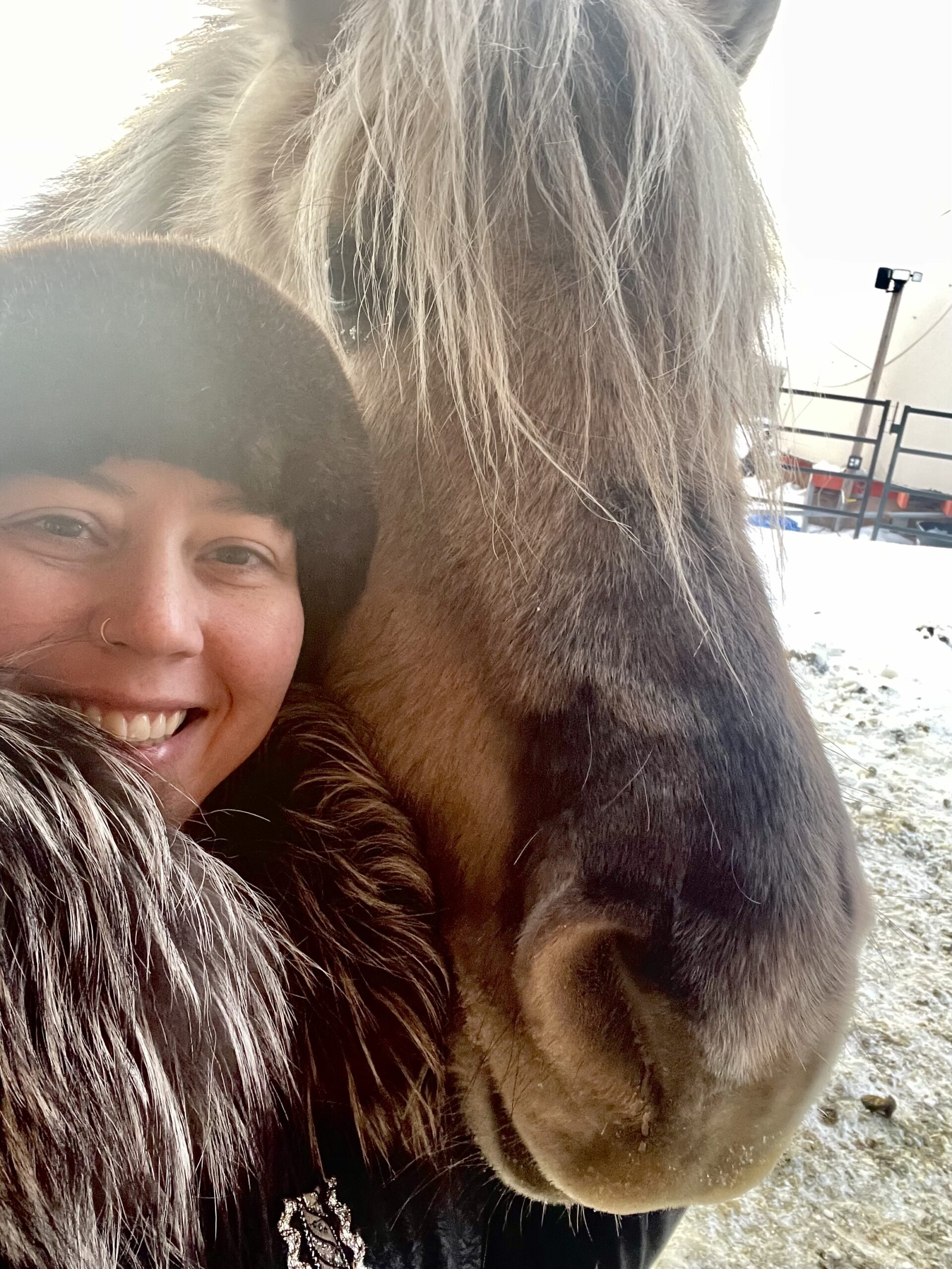 Miranda Musich today, with a horse on her farm on the outskirts of Nome.
Photo courtesy of Miranda Musich, used with
permission.