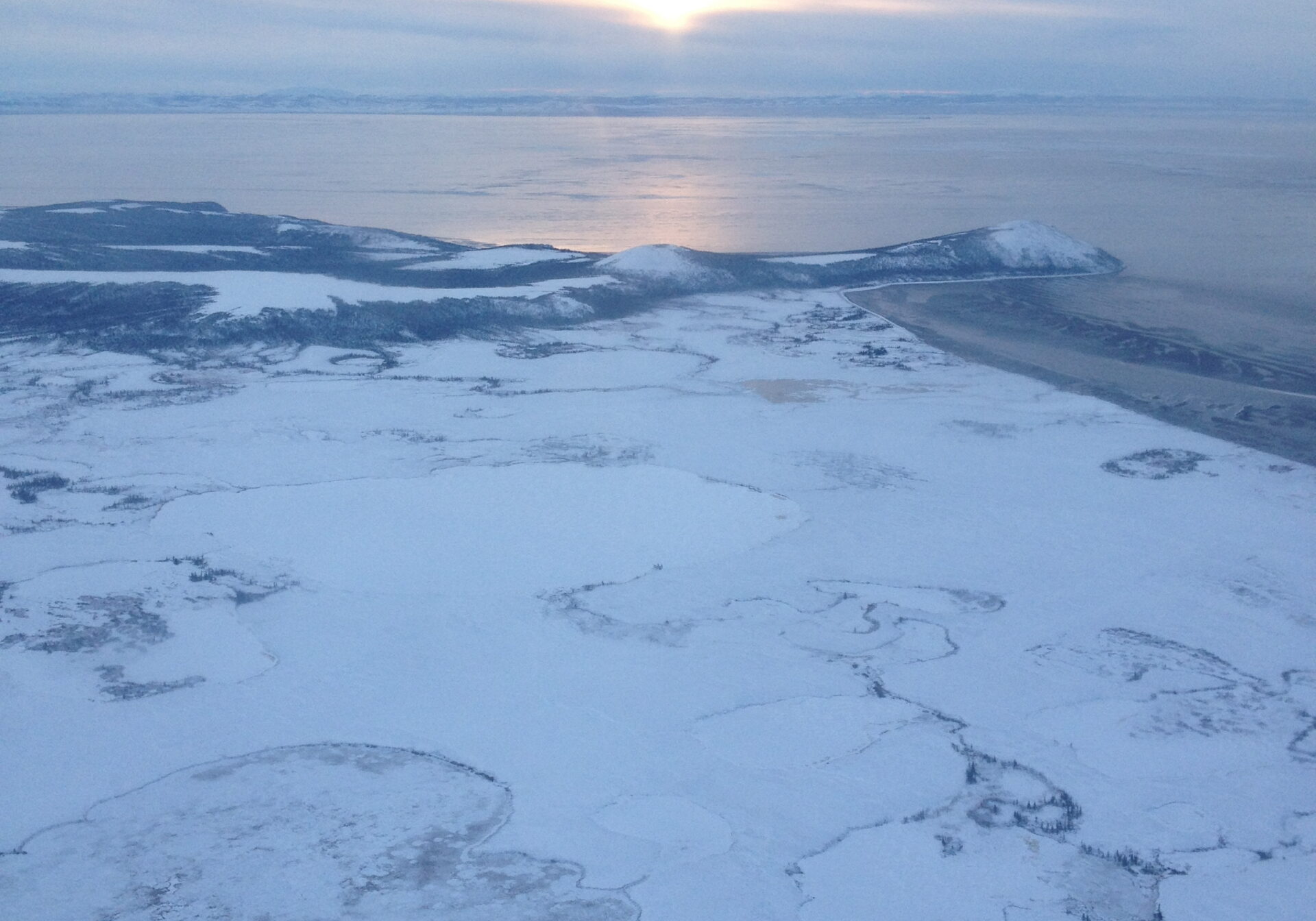 Flying to Koyuk over the frozen tundra. Photo: KNOM file.