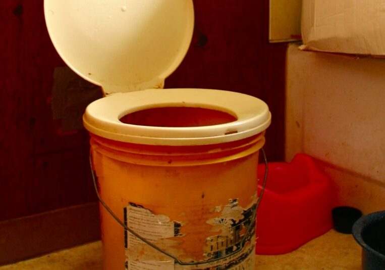 Honey buckets are currently used in Teller. Mayor Blanche Okboak-Garnie attended the WIHAH conference in Anchorage and spoke about Teller's water & sewer problem. Photo Credit: watersewer.alaska.gov (2016)