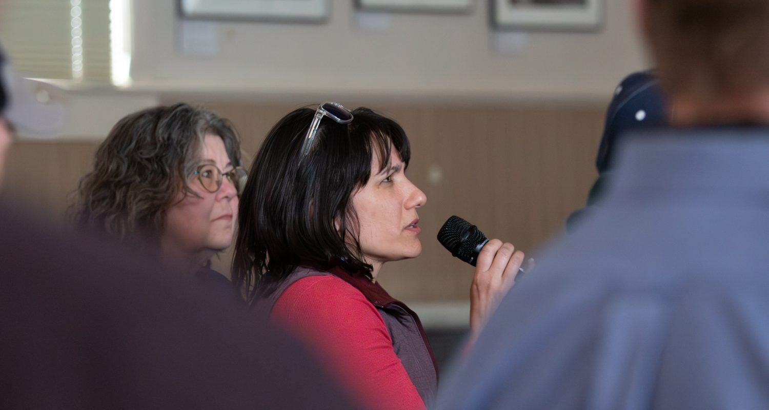 Nome resident and Nome-Beltz Science Teacher, Sarah Liben, asks a question during the Q&A. Ben Townsend photo.
